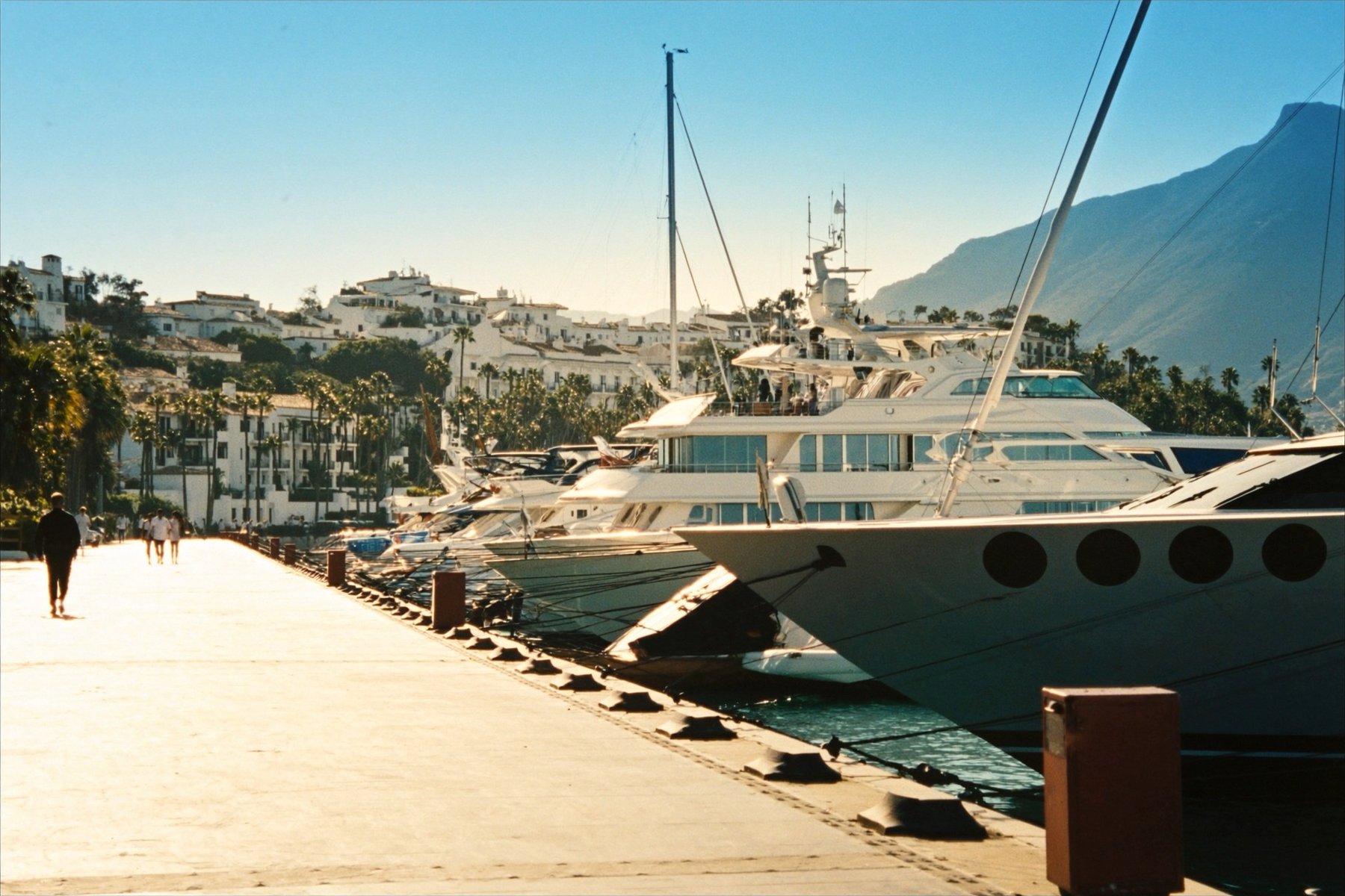 Yachts in Puerto Banús marina with the Sierra Blanca behind, Marbella