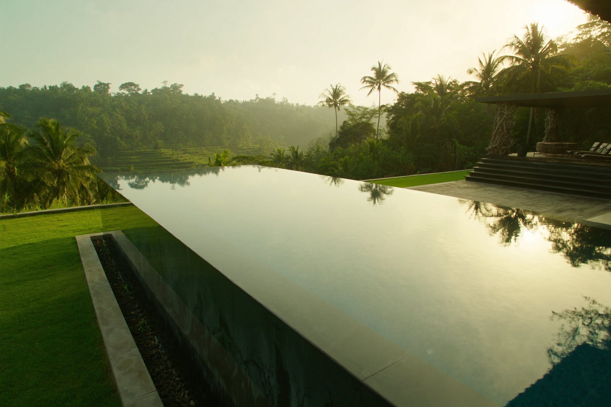 Private villa infinity pool above the jungle and rice terraces of Ubud, Bali